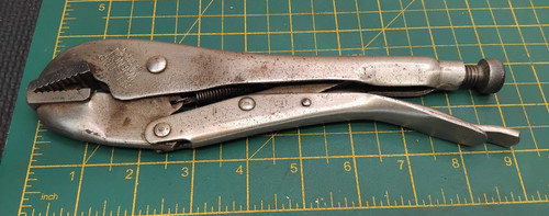 Genuine mole grips working - mole,