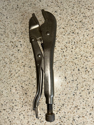 Mole grips self grip wrench - grips.,